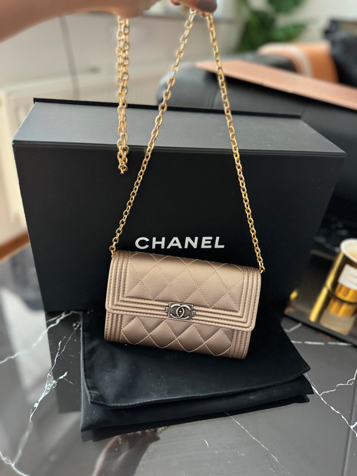 Never worn!! 
Chanel boy leather wallet (chain adaptable)
